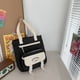 thumbnail image 1 of Get Ready for School with Our New Student Large Capacity Light School Bag - Simple Design with Wide Shoulder Strap, 1 of 5