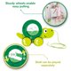 thumbnail image 4 of Juguete Pull Along Hape Tito the Turtle Wood para niños de más de 12 m, 4 of 6