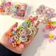 thumbnail image 3 of Set de 5 Pack Gomas Pinzas Elásticas Niñas Coleteros Jhn, 3 of 3