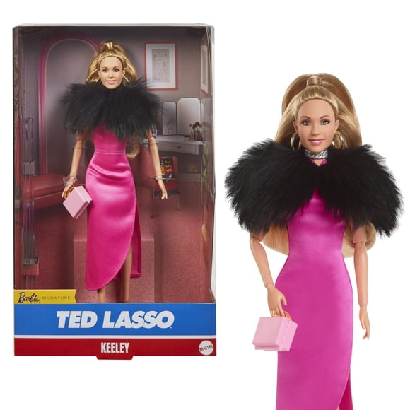 Muñeca exclusiva de Barbie Keeley de Ted Lasso con vestido rosa