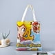 thumbnail image 2 of Princesa Peach Bolso de tela con estampado de lienzo para mujer, bolsa de compras reutilizable y estética, con cremallera interior, regalo para mujer, 35 × 40 cm., 2 of 6