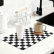 thumbnail image 1 of Tapete de Cocina a Cuadros Negro Yinoos 30x51 cm, 1 of 9