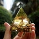 thumbnail image 2 of Pirámide de orgonita, decoración del hogar, hecha a mano, pirámide de orgonita con árbol de la vida, peridoto de 60 mm con piedra de cristal de ojo de tigre, acumulador de orgonita, energía EMF de org, 2 of 7