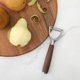 thumbnail image 5 of Pelador de alimentos Sur La Table con mango de madera de nogal, 5 of 7