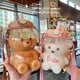 thumbnail image 3 of Botella de agua grande con forma de oso kawaii, con pajita y correa, ideal para mujeres y niñas, ideal para deportes, camping, picnic, senderismo y viajes (1400 ml, morado)., 3 of 7