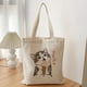 thumbnail image 1 of Cute Cat Eco-Friendly Canvas Luggage Bag: The Perfect Gift for Kids on Children's Day!, 1 of 4