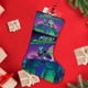 thumbnail image 4 of Calcetines de Navidad Desmarcar Noche de la Zoopocalipsis 45cm x 32cm, 4 of 5