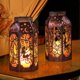 thumbnail image 1 of Juego de 2 faroles solares de metal impermeables con LED – Singingarden, 1 of 9