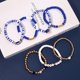 thumbnail image 5 of Set de 7 pulseras NVENF Football Heishi de arcilla elástica – Azul, 5 of 8