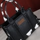 thumbnail image 2 of Bolso Wrangler Tote para mujer con asa superior y correa cruzada, 2 of 3