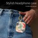 thumbnail image 3 of Estuche suave con llavero vintage mariposa para AirPod 4 – LienWex, 3 of 6
