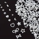 thumbnail image 1 of 100 pcs Sparkling Acrylic Nail Charms - Butterfly, Bear, Flower, Heart, Crown, Starry AB Rhinestones - Perfect for Nail Art and DIY Manicures, 1 of 3
