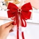 thumbnail image 2 of Accesorios de Cacampanao para Año Nuevo para niñas con lazo grande rojo, cinta de pompón roja, decoración navideña Cacampanaopin al por mayor, 2 of 5