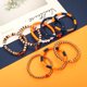 thumbnail image 4 of Pulsera NVENF Football Heishi de arcilla con cuentas elásticas – Pack de 7, 4 of 6