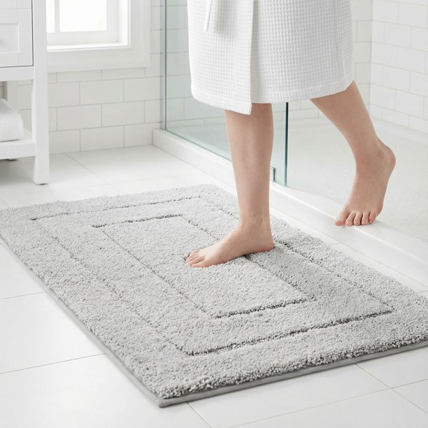 REGALWOVEN Alfombra de baño geométrica, alfombra de baño extra suave y absorbente, alfombra de baño antideslizante de color sólido gris claro 16" x 24"