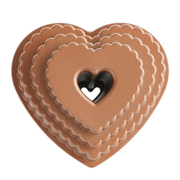Caramelo Bakeware Nordic Ware fundido en forma de corazón escalonado, 12 tazas
