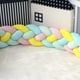 thumbnail image 1 of Almohada de cama trenzada de cuatro hebras con nudo largo tejido, bola kont, tira anticolisión para niños, 1 of 5