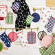 thumbnail image 4 of Set de 2 piezas: Manopla para horno y agarrador para ollas Kate Spade Joy Dot rojo/rosa, 4 of 9