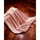 thumbnail image 4 of Manta Decorativa Con Flecos Y Tejido De Rombos En Relieve Color Rosado, 4 of 4