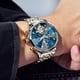 thumbnail image 3 of Reloj OLEVS Automático Esqueleto Tourbillon Bicolor 316L, 3 of 3