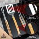 thumbnail image 2 of Set de utensilios para barbacoa BBQ-Aid de 3 piezas, acero inoxidable con mango de madera, 2 of 9