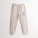thumbnail image 1 of Pantalón de Buzo Niña Logo Beige Hello Kitty, 1 of 3