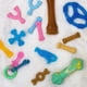 thumbnail image 5 of Juguete masticable Nylabone Dental Dinosaur Puppy Power para cachorros, 5 of 9