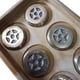 thumbnail image 1 of Caja Con 8 Tejos De Bronce X 8 De 200 Grs, 1 of 2
