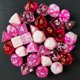 thumbnail image 2 of Set de Dados Poliédricos RPG Bescon Blossom 35 piezas con frasco, 2 of 8