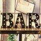 thumbnail image 1 of Letrero de bar con forma de marquesina iluminado con LED Pooqla, 1 of 7