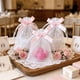 thumbnail image 2 of Bolsas De Organza Suxumhao Con Lazo 100 Piezas Blanco Y Rosa, 2 of 4