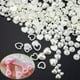thumbnail image 1 of 500 Pcs Half White Pearls Heart Nail Beads Charms Mixed Sizes Spring Summer Flatback ABS Heart Assorted Pearls Heart Beads 3D Nail Art Charms Material Embellishments For Nail Art DIY Crafts Accessorie, 1 of 3
