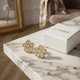 thumbnail image 1 of Aro Carré Flor Circones Enchapado Oro 18k, 1 of 5