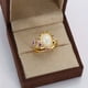 thumbnail image 1 of Exquisite Flower Ring 14k Gold Plated Inlaid Zircon The Whole Ring Surrounded By Beautiful Flowers Inlaid Egg Shape Opal In The Middle, 1 of 2