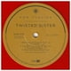 thumbnail image 3 of Twisted Sister - Now Playing: Hits (orange Vinyl) | Vinilo, 3 of 6