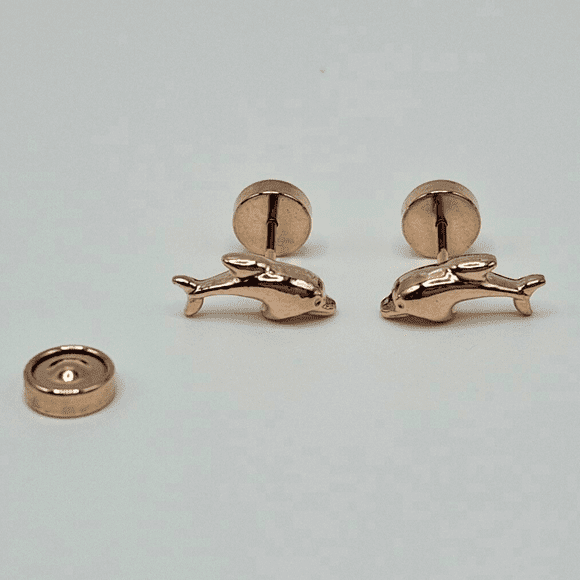Aros abridores para bebé y niña modelo delfín, laminados en oro de 20k.