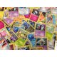 thumbnail image 1 of Cartas coleccionables Pokémon, 50 surtidas, con láminas holográficas adicionales, 1 of 3