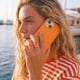 thumbnail image 2 of Carcasa Ultra Suave Naranja para iPhone 14 Plus, 2 of 3