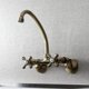 thumbnail image 5 of Grifo de cocina Kingston Brass Kingston de montaje en pared, latón antiguo, 5 of 6