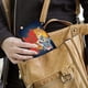 thumbnail image 5 of Tom y Jerry Porta Pasaporte y Cartera de Viaje Premium de Cuero PU, Funda de Pasaporte Bloqueo RFID con Ranuras para Tarjetas de Crédito, Estuche para Libro de Pasaporte para Familia 10cm × 15cm, 5 of 6