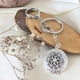 thumbnail image 1 of Llavero Relicario de Plata con Foto Personalizada – el recuerdo que llevas siempre contigo, 1 of 4