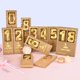thumbnail image 5 of Vela CAKE CODE 7 cm Oro Número 11 – Pack de 2, 5 of 6