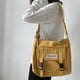 thumbnail image 1 of Upgrade Your Preppy Style with Our Trendy Shoulderbag - Perfect for Students! Featuring a Cute Cartoon Decor and Spacious Interior with Plastic Buckle and Zipper Closure., 1 of 5