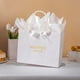 thumbnail image 3 of Bolsa de regalo para matrimonio Crisky, blanca, 10.25 x 13 x 4.75 in, 3 of 3
