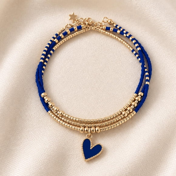 Pulsera Miyuki Azul con Dije de Corazón – el azul color de la calma dorado