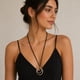 thumbnail image 1 of Collar Negro Con Dije De Aros Dorado Y Plateado 34 Cm, 1 of 3