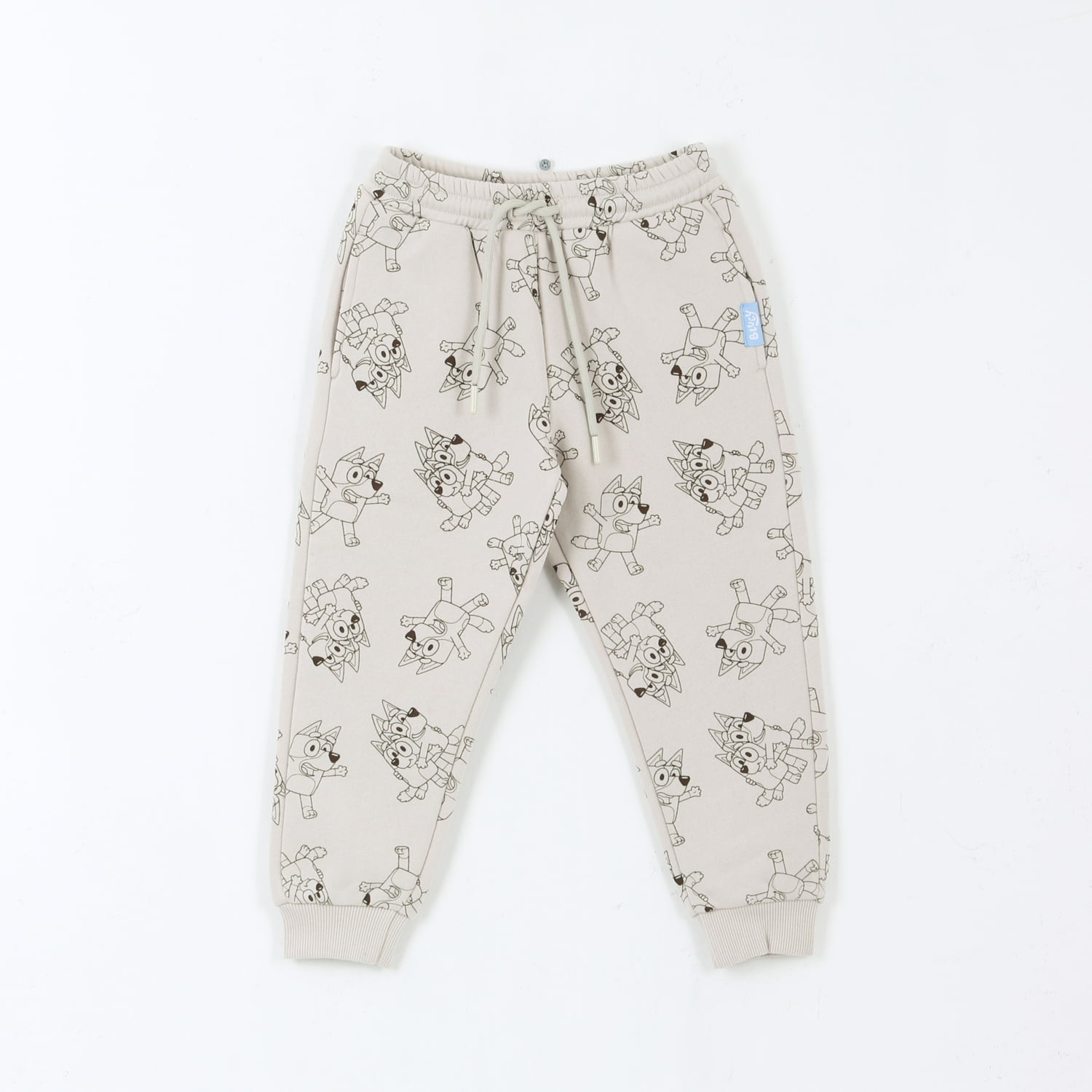 Pantalón De Buzo Niño Full Print Lineal Beige Bluey