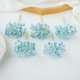 thumbnail image 1 of Xiao Hua Paquete de 5 ramos - Ramo artificial azul, 11 x 7 cm, con tallos de plástico suaves y flexibles, aspecto natural, perfecto para decoración de fiestas y decoración de casas de campo., 1 of 3