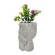 thumbnail image 2 of Planta artificial con macetero de cara de cemento, 2 of 4