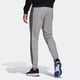 thumbnail image 2 of Pantalones deportivos adidas Standard Essentials de forro polar con 3 rayas para hombre, 2 of 7
